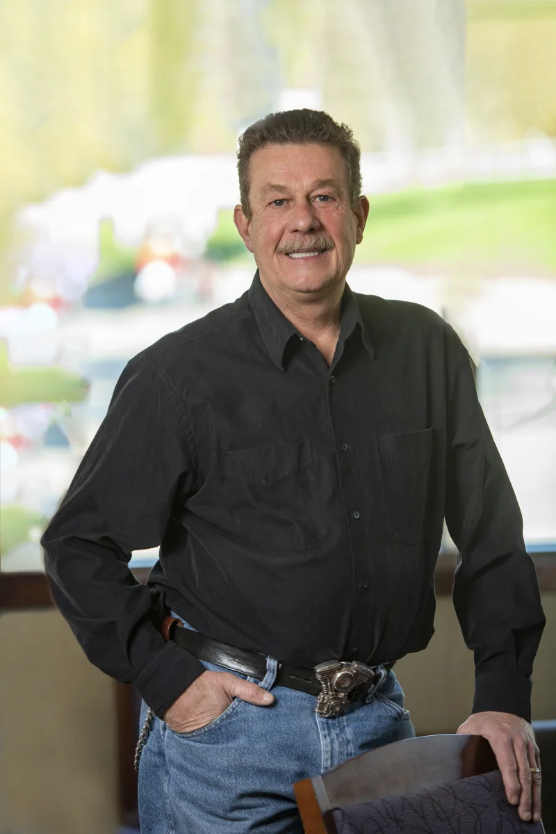 A smiling Gendler Dental Center patient